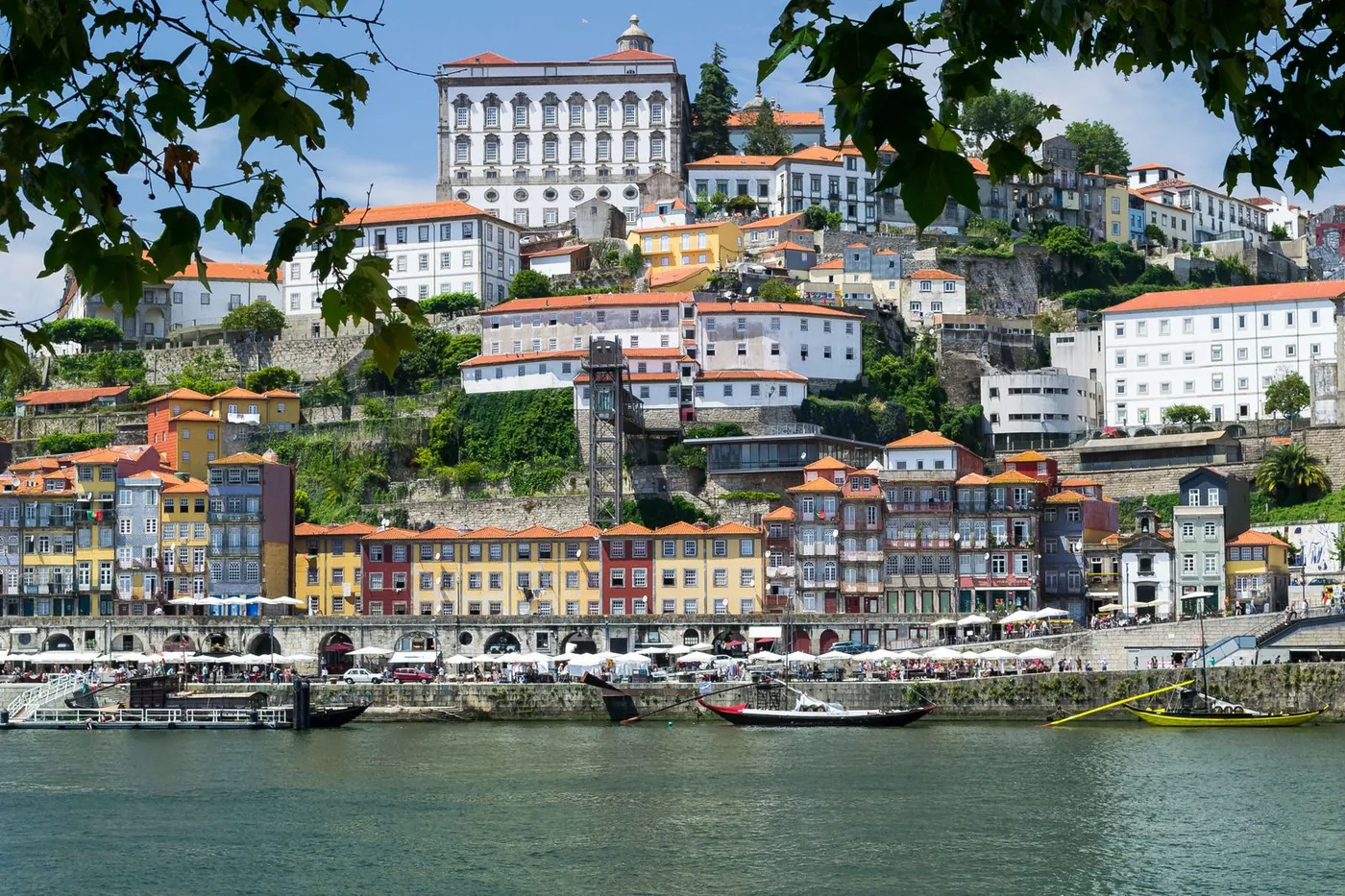 A riverside street of coloured houses in a Portuguese city